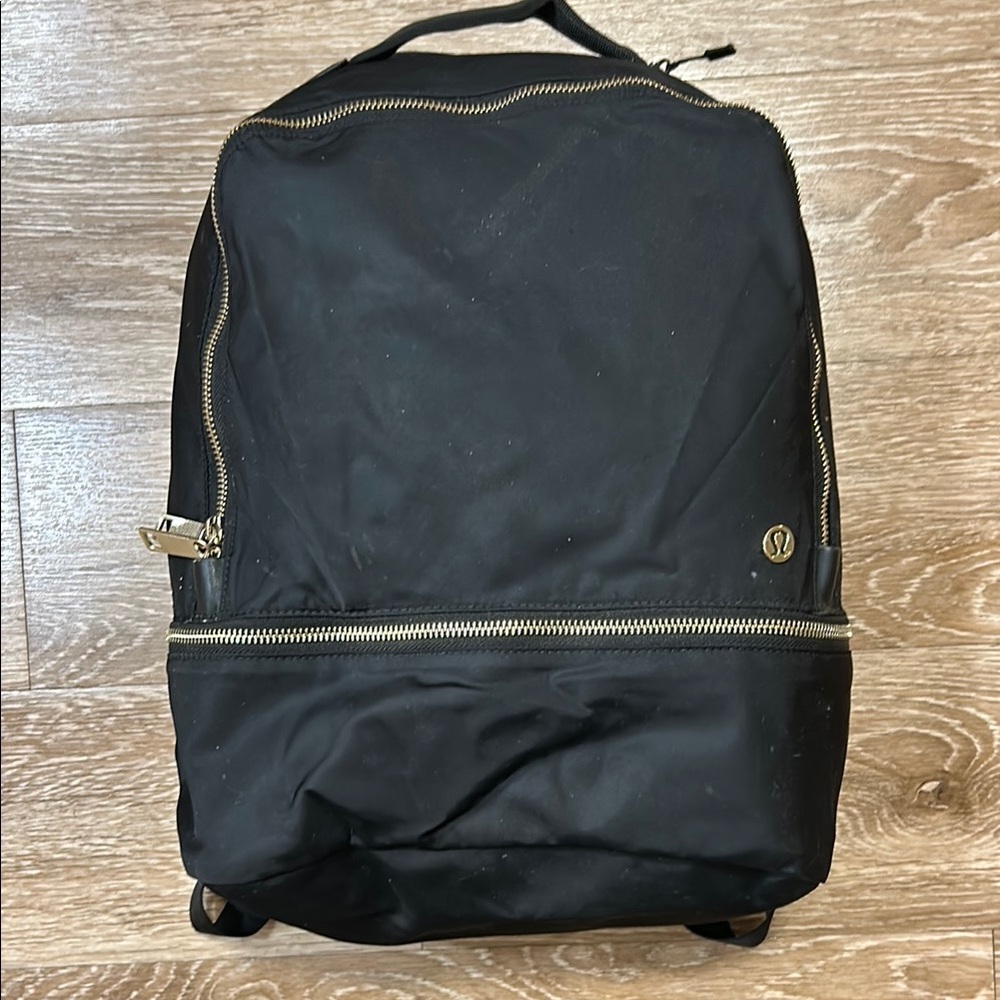 Lululemon Black Backpack with Gold Accents